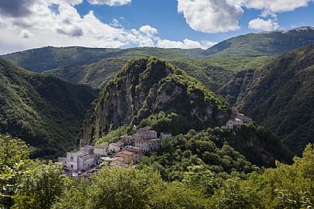 The ancient medieval village of Ponte in the middle of the mountains covered by dense and green woods, Valnerina, Umbria, Italy, Europe