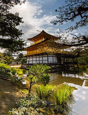 Kinkaku-ji or golden pavilion temple is Japan's most famous leading temples, World Cultural Heritage featuring a shining golden pavillion reflected in a lake, Kyoto, Japan
