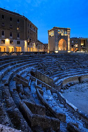 The Roman amphitheater, located in Piazza Sant'Oronzo square at twilight, Lecce, Salento, Apulia, Italy, Europe
