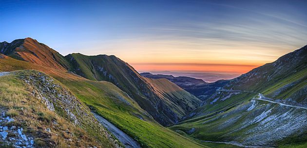 Dawn from the top of Pizzo Tre Vescovi peak and in the background the Adriatic sea, Sibillini national park, Ussita, Marche, Italy, Europe