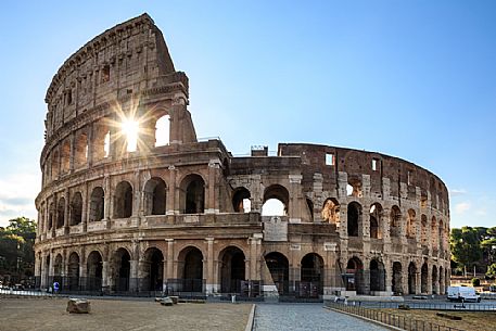 Rome: the early morning sun through the arches of the Colosseum