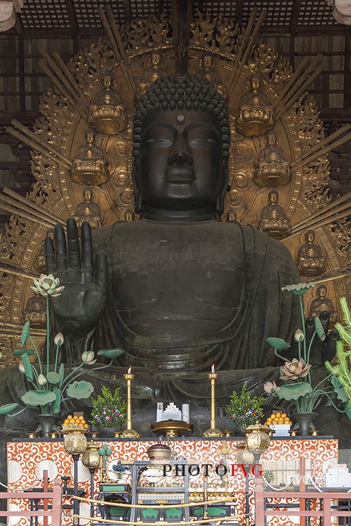 Big Buddha Daibutsu or giant Buddha is  is a bronze statue in the largest wooden structure in the world in the Todai-ji Temple. This sitting statue is more than 15 meters high and  more than 250 tons weigh, Nara, Japan