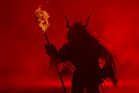 Krampus are horned, antropomorphic folklore figures companions of Saint Nicholas. You can meet them on the 5th or 6th December in regions including Austria, Bavaria, Croatia, Hungary, Slovenia and Northern Italy. This photo was taken in Tarvisio, Friuli Venezia Giulia, Italy