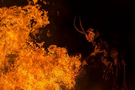 Krampus are horned, antropomorphic folklore figures companions of Saint Nicholas. You can meet them on the 5th or 6th December in regions including Austria, Bavaria, Croatia, Hungary, Slovenia and Northern Italy. This photo was taken in Tarvisio, Friuli Venezia Giulia, Italy