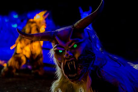 Krampus are horned, antropomorphic folklore figures companions of Saint Nicholas. You can meet them on the 5th or 6th December in regions including Austria, Bavaria, Croatia, Hungary, Slovenia and Northern Italy. This photo was taken in Tarvisio, Friuli Venezia Giulia, Italy