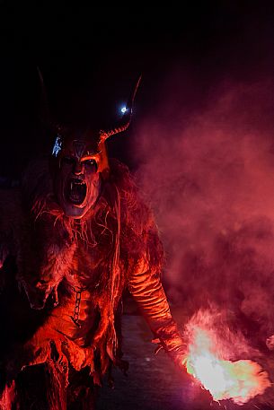 Krampus are horned, antropomorphic folklore figures companions of Saint Nicholas. You can meet them on the 5th or 6th December in regions including Austria, Bavaria, Croatia, Hungary, Slovenia and Northern Italy. This photo was taken in Tarvisio, Friuli Venezia Giulia, Italy