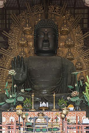 Big Buddha Daibutsu or giant Buddha is  is a bronze statue in the largest wooden structure in the world in the Todai-ji Temple. This sitting statue is more than 15 meters high and  more than 250 tons weigh, Nara, Japan