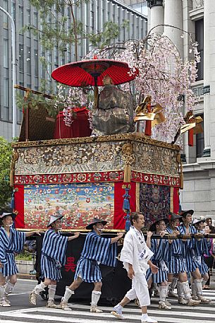 Gion Matsuri is the Japan's most famous festival during the entire month of July,  in which locals and visitors gather to promenade in colorful yucata robes, Kyoto, Japan 