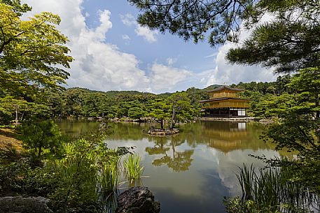 Kinkaku-ji or golden pavilion temple is Japan's most famous  leading temples, World Cultural Heritage featuring a shining golden pavillion reflected in a  centered lake, kyoto, Japan