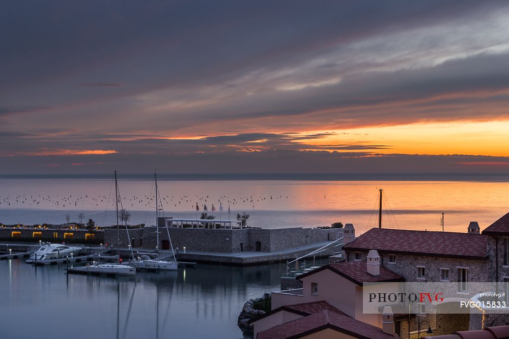 View of Portopiccolo from above at the end of the sunset