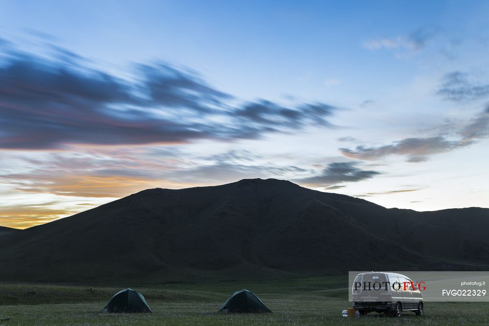 The sunrise after a night spent sleeping in tent in the mongolian steppe.