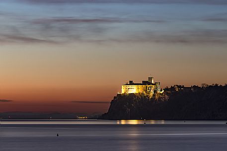 View of Duino's castle from Portopiccolo after the sunset