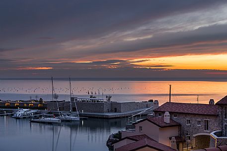 View of Portopiccolo from above at the end of the sunset