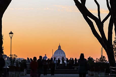 San Peter Basilica from the Garden of Oranges at sunset.