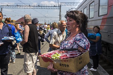 babushka, one of some women selling food in the stations where transiberian trains stop for a couple of minutes.