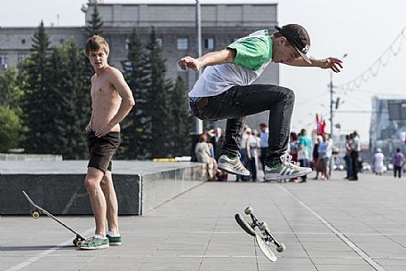 Young boys skateboarding in the central square of Novosibirsk, Russia