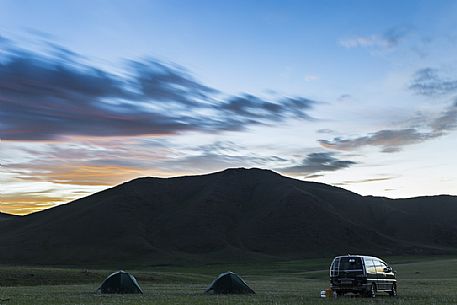 The sunrise after a night spent sleeping in tent in the mongolian steppe.