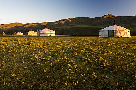 Sunrise to typical nomadic tents: the ger, Mongolia