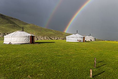 Two rainbows above some typical mongolian tents, ger, Mongolia