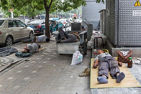 Some workers resting after lunch, Peking, China