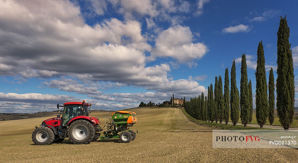 Work in the tuscan fields, Orcia valley, Tuscany, Italy