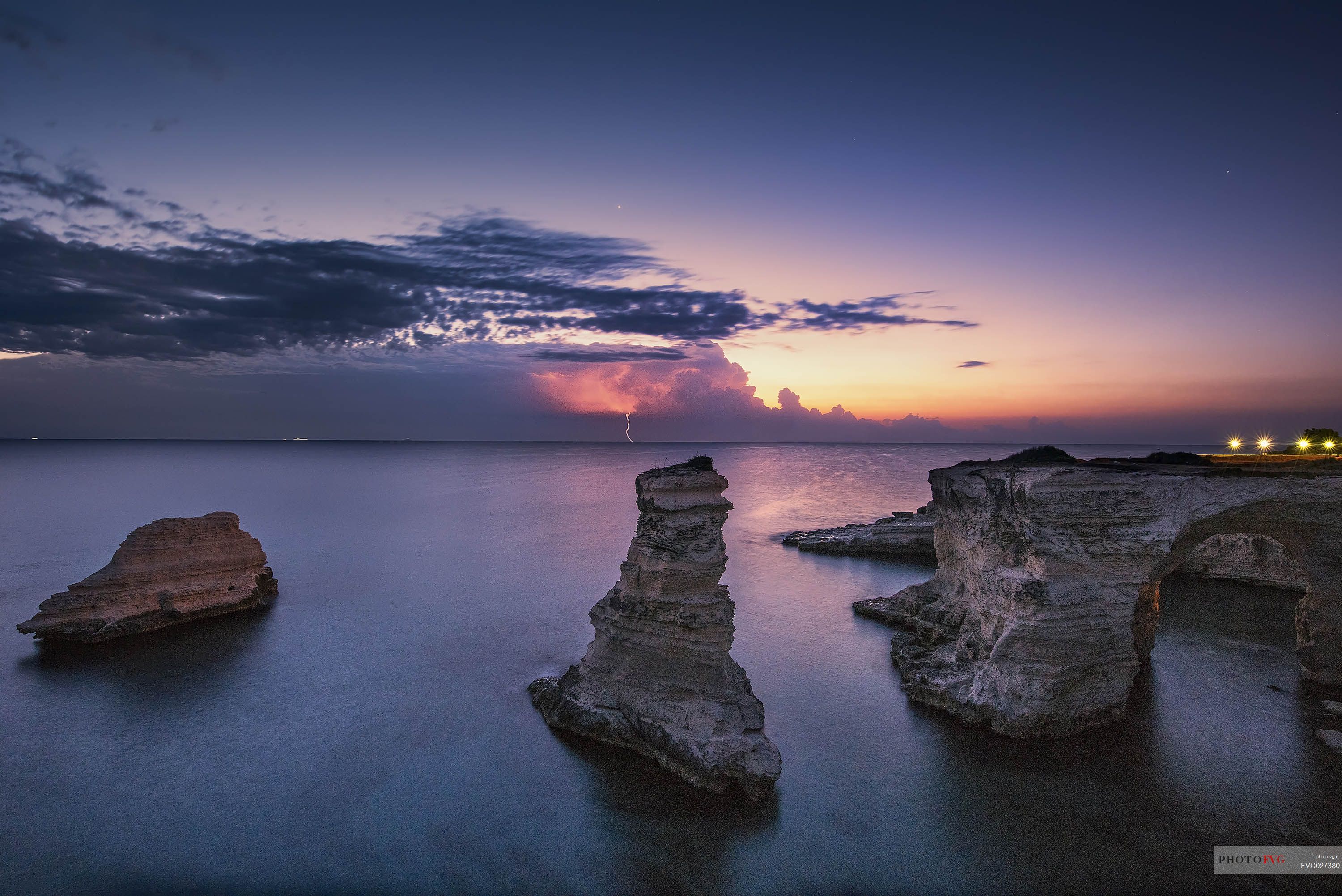 Sunrise on Torre Sant Andrea or St. Andrew's tower reefs, Salentine peninsula, Apulia, Italy