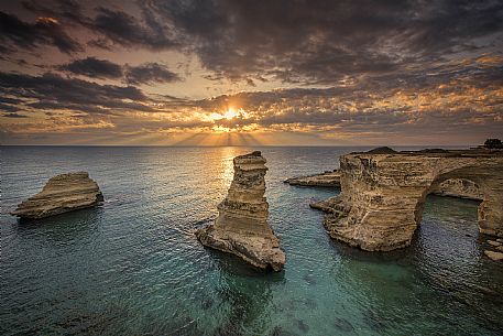 Sunrise on Torre Sant Andrea or St. Andrew's tower reefs, Salentine peninsula, Apulia, Italy