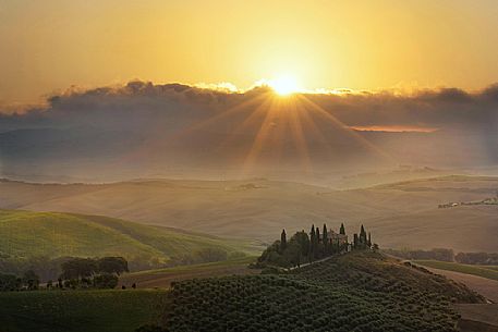 The Belvedere farm, Podere Belvedere in a foggy sunrise, San Quirico d'Orcia, Orcia valley, Tuscany, Italy, Europe