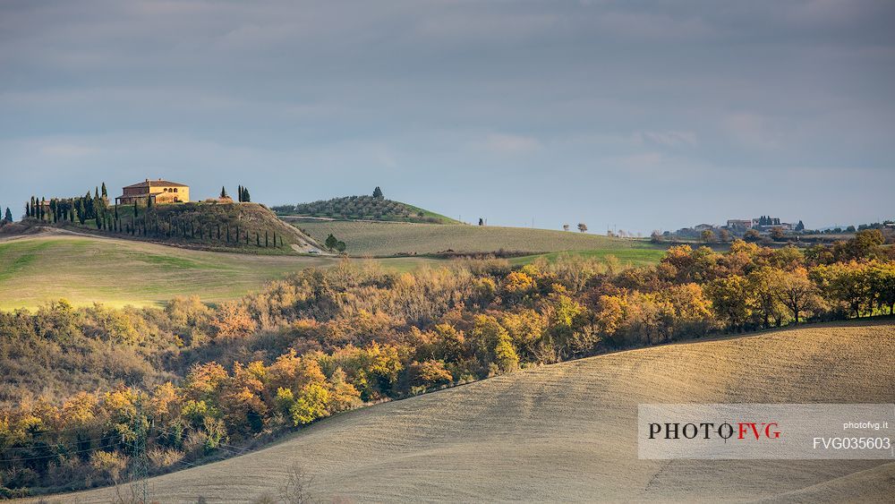 The beauty of the hills in Val d'Orcia, ridges and farmhouses typical of Tuscan beauties, Pienza, Orcia valley, Tuscany, Italy, Europe