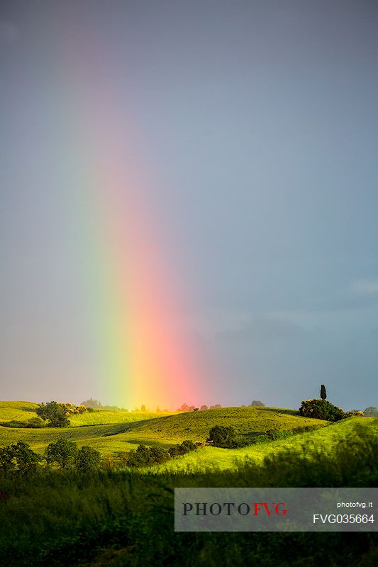 Rainbow in the hills of Val d'Orcia, Tuscany, Italy, Europe