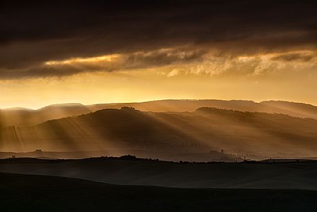 The beauty of the hills in Val d'Orcia at sunset, Tuscany, Italy, Europe