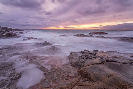 Sea rocks at twilight, Calafuria, Livorno, Tuscany, Italy