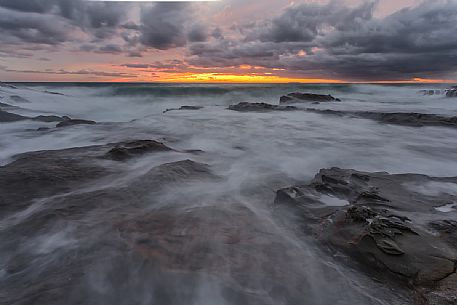 Sea rocks at twilight, Calafuria, Livorno,Tuscany, Italy