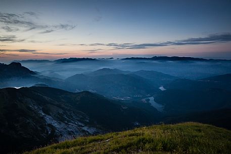 Fog between the mountains in the Apuane Alps, Pena di Sumbra mount, Tuscany, Italy, Europe