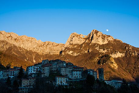 Pruno a little village in the Apuane alps mountains, in the background the Monte Forato peak, Tuscany, Italy, Europe