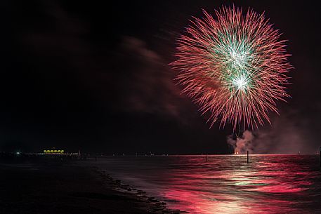 Fireworks on the sea, Lignano Sabbiadoro, Friuli Venezia Giulia, Adriatic coast, Italy, Europe