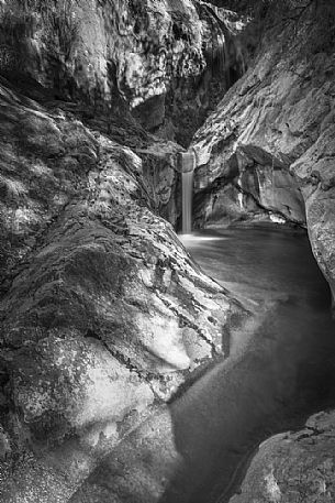 The water tells. Scrolling and playing on the rock. Erosion that gives birth spectacles of nature, Orvenco river, Friuli Venezia Giulia, Italy, Europe