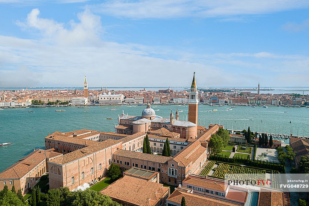 Shot from above of the church of San Giorgio, in the background San Marco and the whole basin
