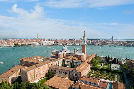 Shot from above of the church of San Giorgio, in the background San Marco and the whole basin