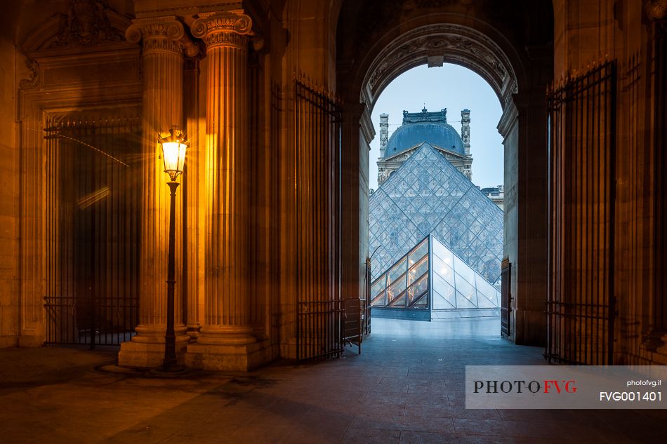 Cour Carre and Louvre's Pyramids at the blue hour