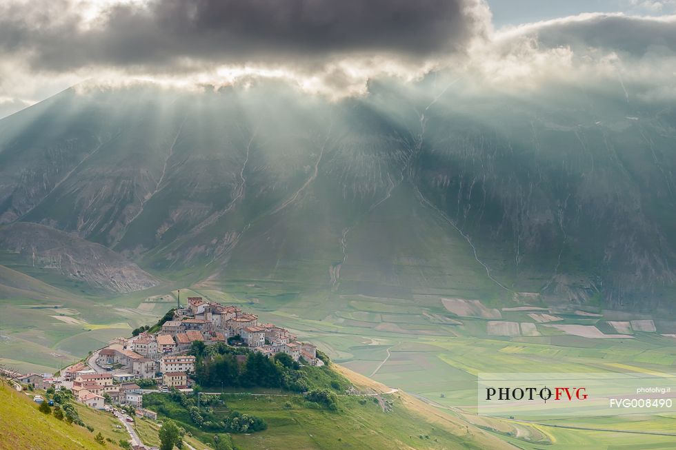 Morning view of Castelluccio, Piano Grande and Monte Vettore under a big cloud Morning view of Castelluccio, Piano Grande and Monte Vettore under a big cloud