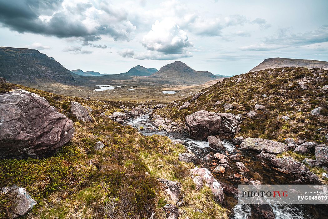 The river born from a glacier lake up the mountain in the Beinn Eighe national nature reserve, Torridon, Highlands, Scottish, United Kingdom