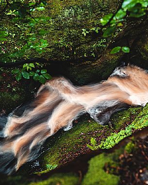 Long exposure of the river near the Devils Pulpit, a gorge located a few miles from Glasgow, Scotland, United Kingdom, Europe