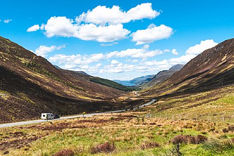 Caravan in Glen Docherty, in the background the Loch Maree, Highlands, Scotland, United Kingdom