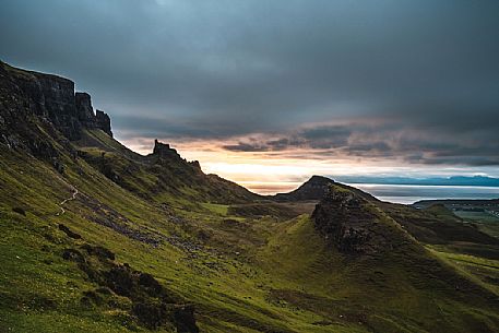 The sunrise over lunar landscape of Quiraing, Trotternish Peninsula in the Isle of Skye, Highands, Scotland, United Kingdom, Europe