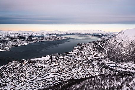 View from Storsteinen Hill (418m) of the city  of Tromso and Tromsoeysund with Tromsoe Bridge, Norway, Europe