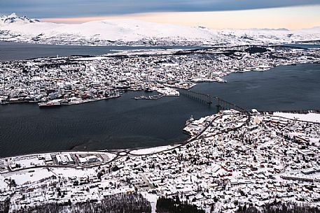 View from Storsteinen Hill (418m) of the city  of Tromso and Tromsoeysund with Tromsoe Bridge, Norway, Europe