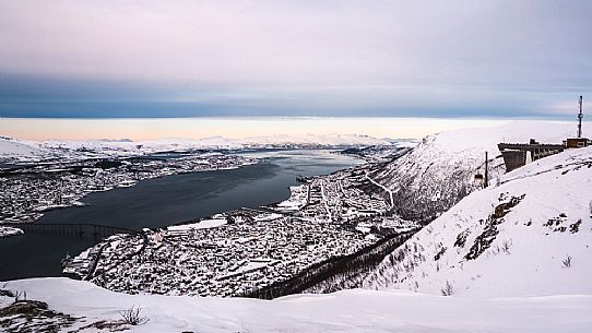 Top Station of Fjellheisen Cable Car on Storsteinen Mountain (418m) with view of the city and Tromsoysund, Tromso, Norway, Europe
