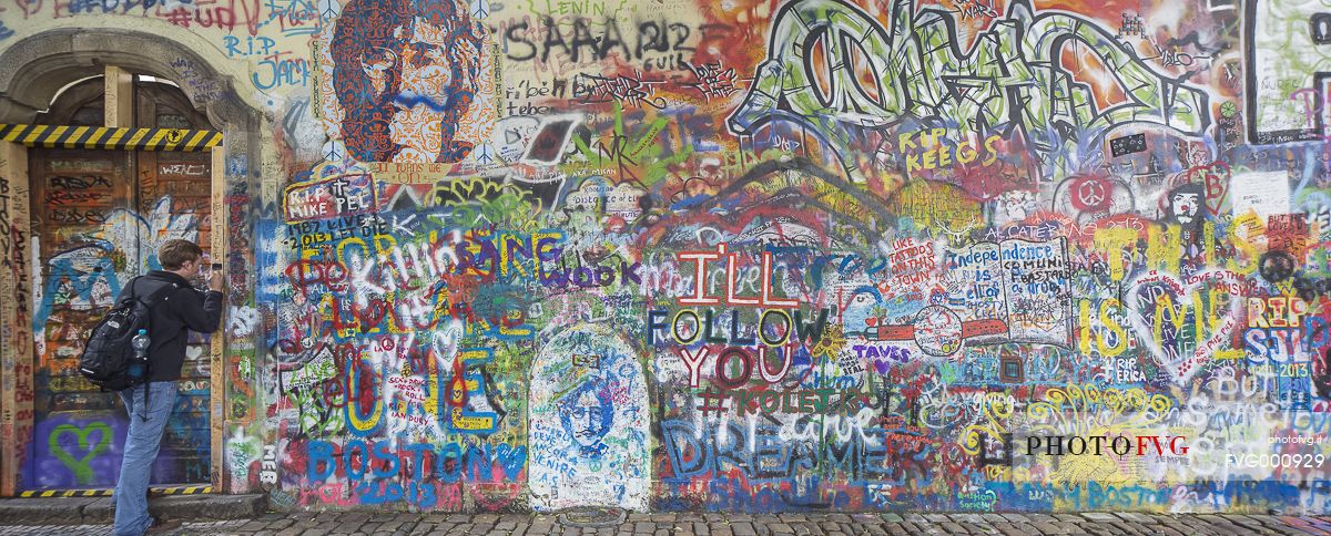 Tourist signing The John Lennon
Wall in Mala Strana Tourist signing The John Lennon
Wall in Mala Strana