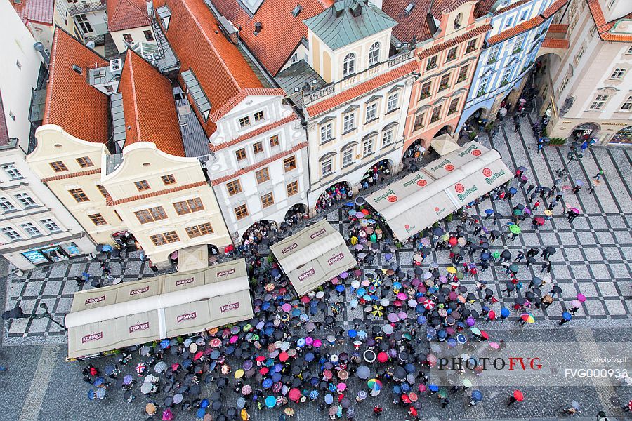 A view from above of Old Town Square, Staromestsk Nmest, with coloured umbrellas